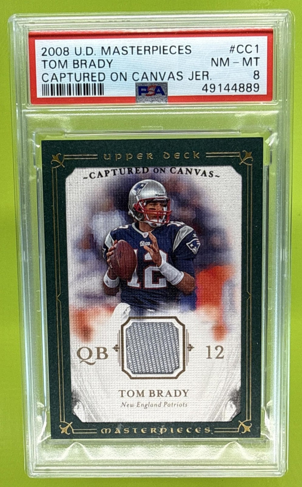 2008 UPPER DECK MASTERPIECES TOM BRADY #CC1 CAPTURED ON CANVAS JERSEYS PSA 8