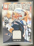 2013 PANINI ELITE TOM BRADY #42 GRIDIRON GEAR /49 PATRIOTS